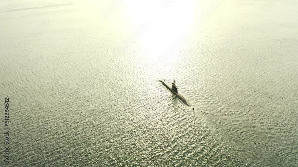 Drone of submarine, boat and cruise travel in sunshine for transportation, navy army and military sea protection. Aerial view, marine warship and steel fleet sailing on ocean, naval battle or journey Drone of submarine, boat and cruise travel in sunshine for transportation, navy army and military sea protection. Aerial view, marine warship and steel fleet sailing on ocean, naval battle or journey