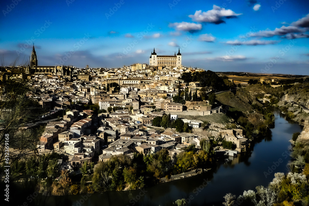 Panorama of an old feudal city located on a hilltop surrounded by the river