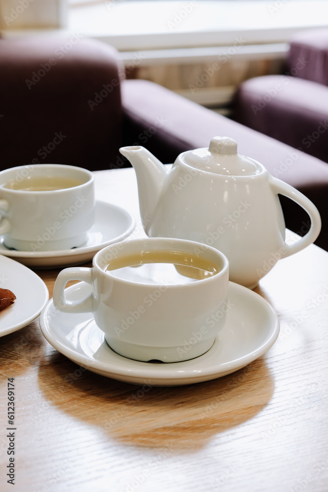 Cups of tea on a table in a cafe. Tea ceremony. Cups of tea on a table in a cafe. Tea ceremony.