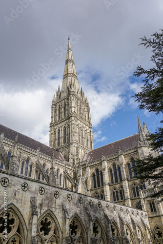 Exterior of Salisbury Cathedral in the UK. Gothic architecture of impressive landmark cathedral with tall spire. 