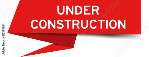 Red color speech banner with word under construction on white background