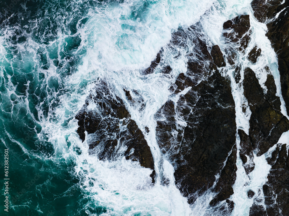 Seashore aerial view,Bird eye view photo of crashing waves on rocks beautiful water surface texture,Dark sea background,Beautiful nature seascape,Amazing view sea background