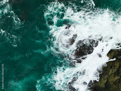 Top view Seashore cliff at Phuket Thailand, beautiful waves crashing on rocks seacoast in open sea summer landscape seascape,Nature environment and Travel background