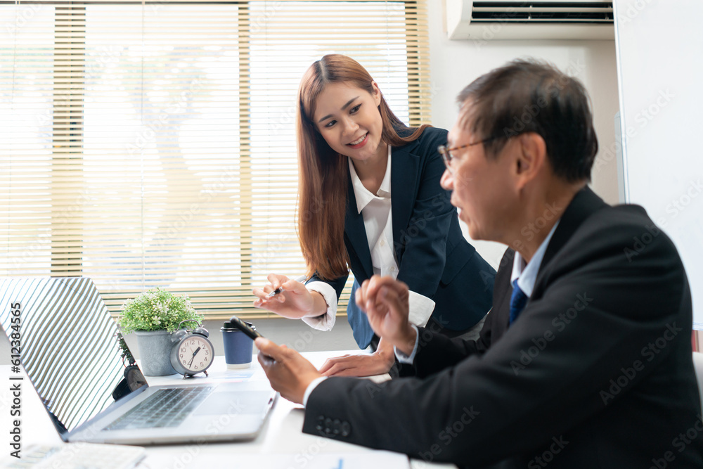 Business partnership concept, Business senior read data on smartphone while discussing with partner Business partnership concept, Business senior read data on smartphone while discussing with partner