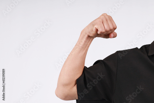 male hand clenched fist in white background