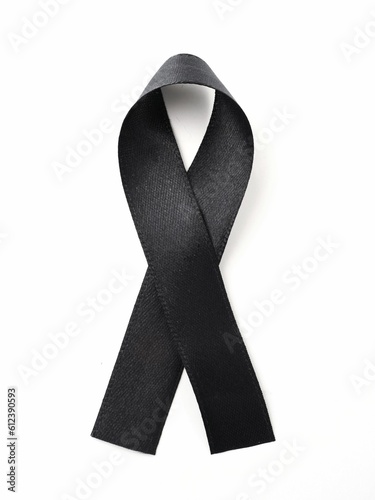 Black mourning ribbon isolated on white 