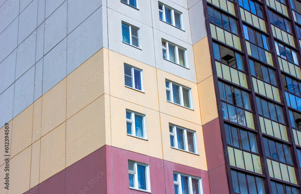 Architectural design of apartment buildings. External view of a new building, residential building, apartments. Modern houses, apartments.Facade of a high-rise apartment