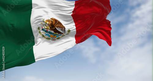 Mexican national flag waving in the wind photo