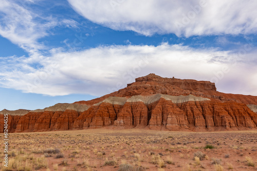 Rocky block of cliffs in the shape of towers. Located in south-central Utah in the heart of red rock country, Capitol Reef National Park Utah is a hidden treasure filled with cliffs, canyons, domes, a