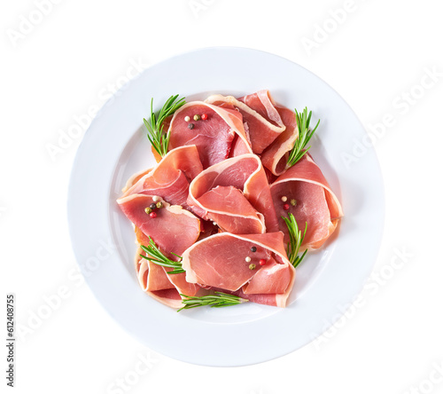 Spanish jamon cut, parma ham cutting with rosemary and spice in a plate isolated on white background.