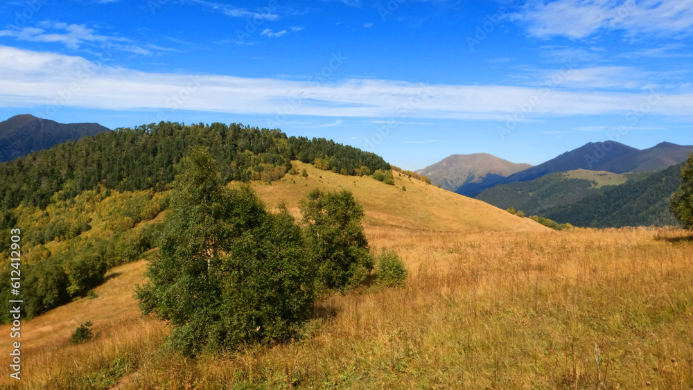 mountainscape, view of Arkhyz mountains at fall with blue sky - photo of nature