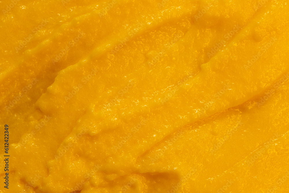 Fruit yogurt ice cream. Smoothies from fresh fruits and berries. Ice cream texture. Delicious sweet dessert close-up as a background. Fruit yogurt ice cream. Smoothies from fresh fruits and berries. Ice cream texture. Delicious sweet dessert close-up as a background.