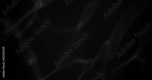 moving light reflections, glittering lights from water surface on black wall