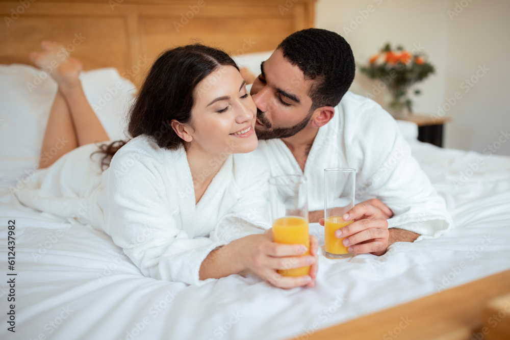 Husband Kissing Wife Having Morning Drink And Breakfast At Hotel Husband Kissing Wife Having Morning Drink And Breakfast At Hotel