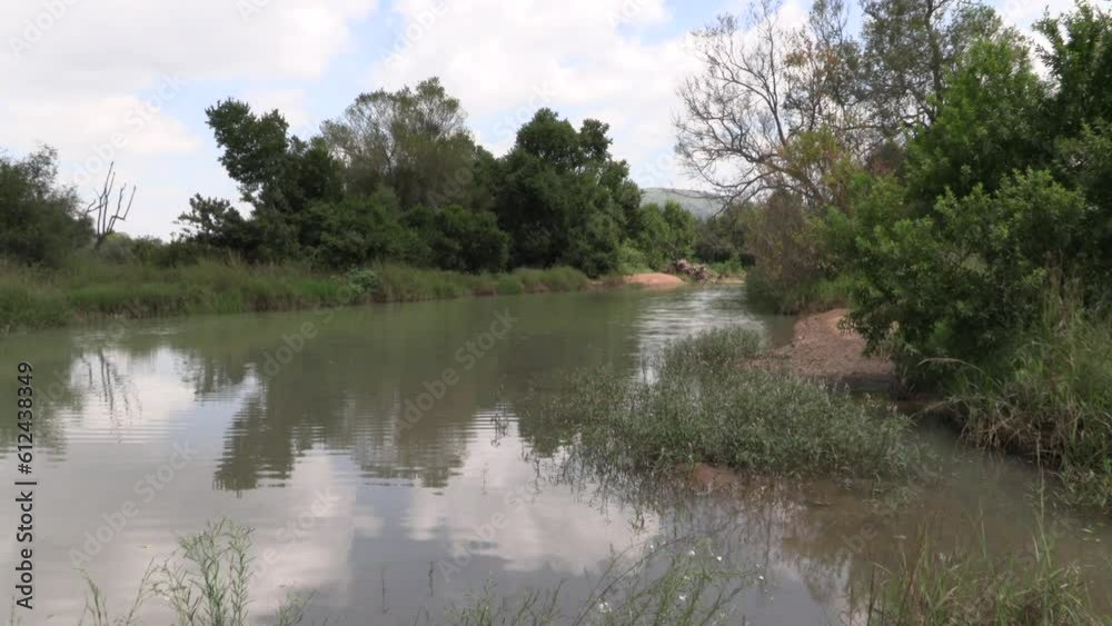 Peaceful scene of a river in Pilanesberg Game Reserve, South Africa Peaceful scene of a river in Pilanesberg Game Reserve, South Africa