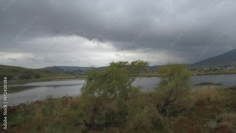 Driveby shot of wetland in Wakkerstroom, Mpumalanga, South Africa Driveby shot of wetland in Wakkerstroom, Mpumalanga, South Africa