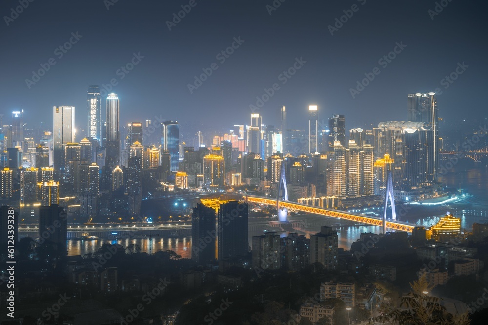 Illuminated modern city at night