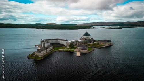 Canvas Print Aerial view of statue in background of Saint Patrick Purgatory church in Donegal