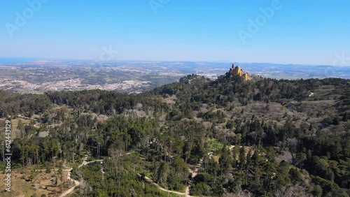 Drone view over landscapes with a background of the Park and National Palace of Pena in Portugal