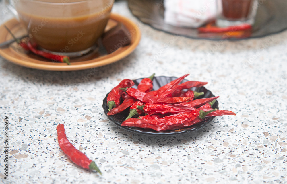 Close up red hot chili peppers on wooden background Close up red hot chili peppers on wooden background