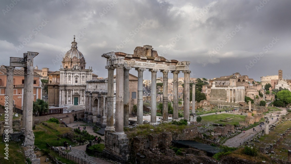 View of the Roman forum with the ruins of the Arch of Septimius Severus and the Temple of Saturn
