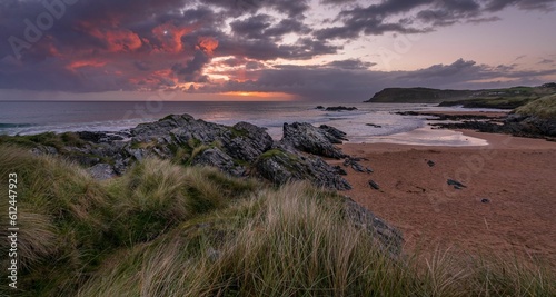 Scenic landscape of Culdaff beach in North Donegal during the colorful sunset, Ireland