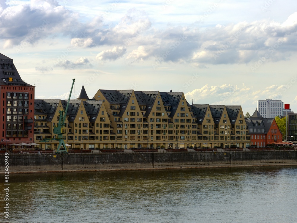 Typical, residential buildings along the river in Cologne, Germany