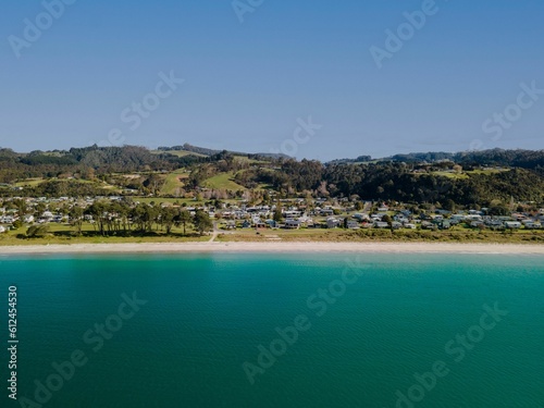 Aerial view of the sea and Cooks Beach  Coromandel Peninsula in New Zealand s North Island