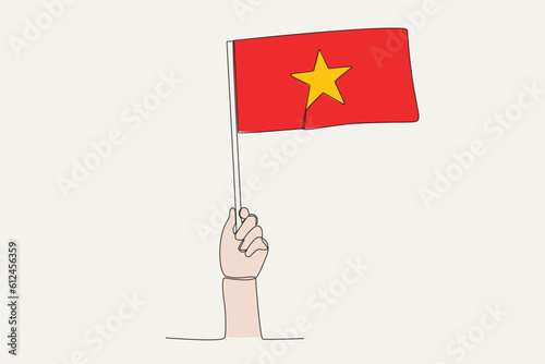 A hand raised the Vietnam flag. Flag one-line drawing © stlineart