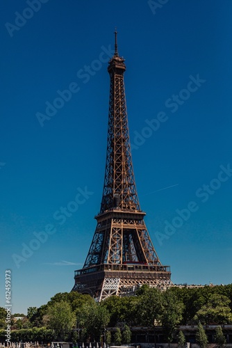 Eiffel Tower in Paris on a sunny day with blue sky