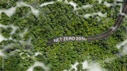 Net Zero 2050 Carbon Neutral and Net Zero Concept Natural Environment Long-term, climate-neutral strategy greenhouse gas emissions target Top view with green forest with asphalt road