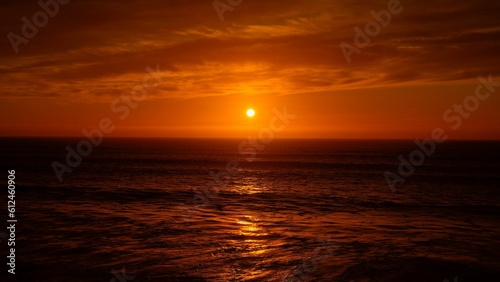 Beautiful bright orange sunset sky over the Playas de Rosarito, Mexico