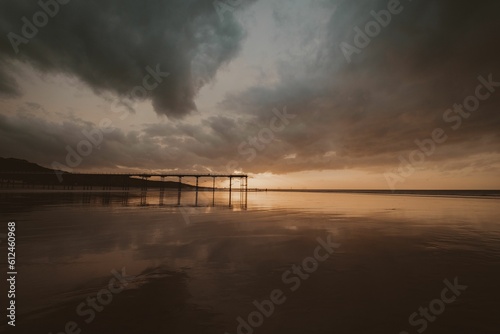 Silhouette shot of the pier at Saltburn beach in Saltburn-by-the-Sea, North Yorkshire
