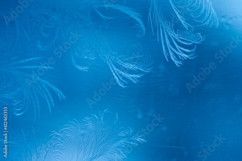 3d rendered illustration of snow frost on windows isolated on a blue background © Baitang Ning1/Wirestock Creators