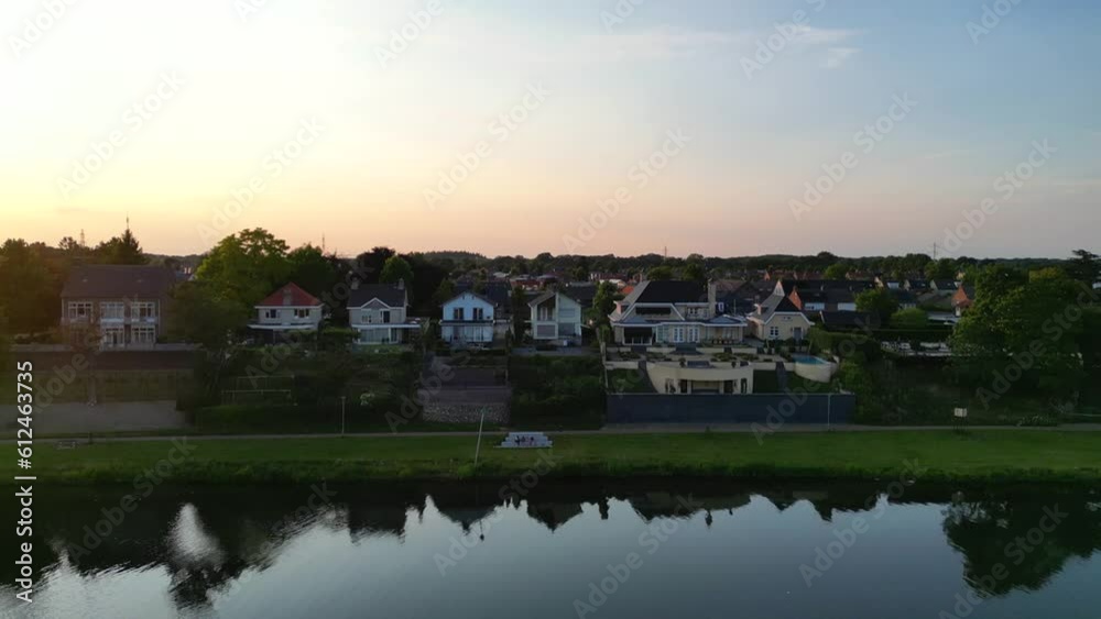 Aerial view of modern buildings near the lake at sunset Aerial view of modern buildings near the lake at sunset