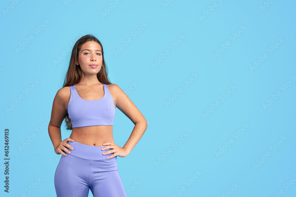 Positive confident millennial caucasian slim woman in sportswear look at camera Positive confident millennial caucasian slim woman in sportswear look at camera