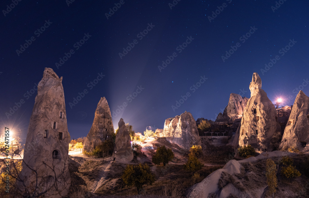 Night landscape Uchisar Castle ancient cave in Cappadocia with star, Turkey
