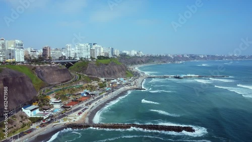 Aerial view of the Miraflores coastline in Lima, Peru - slow motion photo