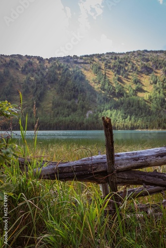 Vertical shot of a lake at the foot of the hill