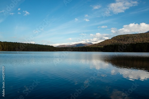 Beautiful view of the lake near the mountains in Cairngorms, Scotland