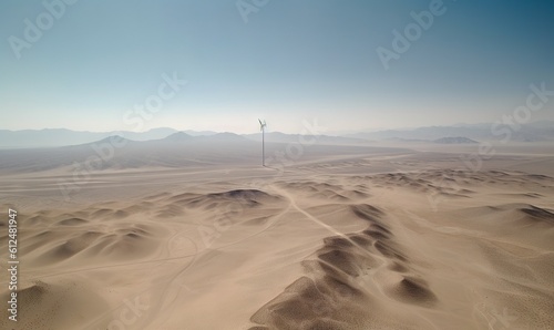  a wind turbine in the middle of a desert landscape with mountains in the distance and a blue sky in the background with a few clouds. generative ai