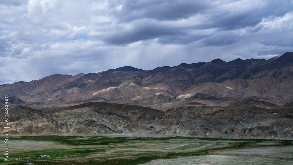 Mesmerizing mountains landscape under a gloomy sky in the Hanle region, Leh, Ladakh Mesmerizing mountains landscape under a gloomy sky in the Hanle region, Leh, Ladakh