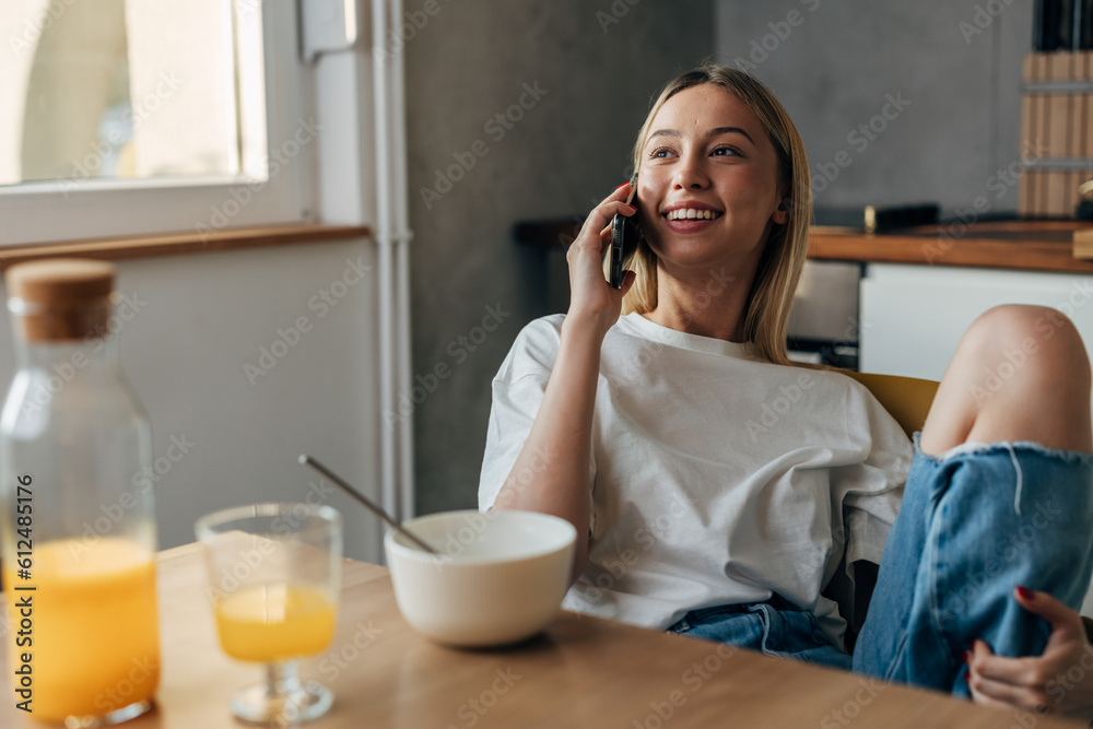 A beautiful woman enjoying a telephone call. A beautiful woman enjoying a telephone call.