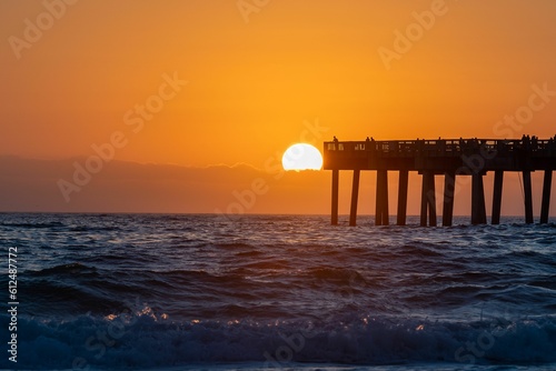 Scenic shot of Florida Panhandle, Gulf coast, USA during a golden hour at sunset © Jay_30a/Wirestock Creators