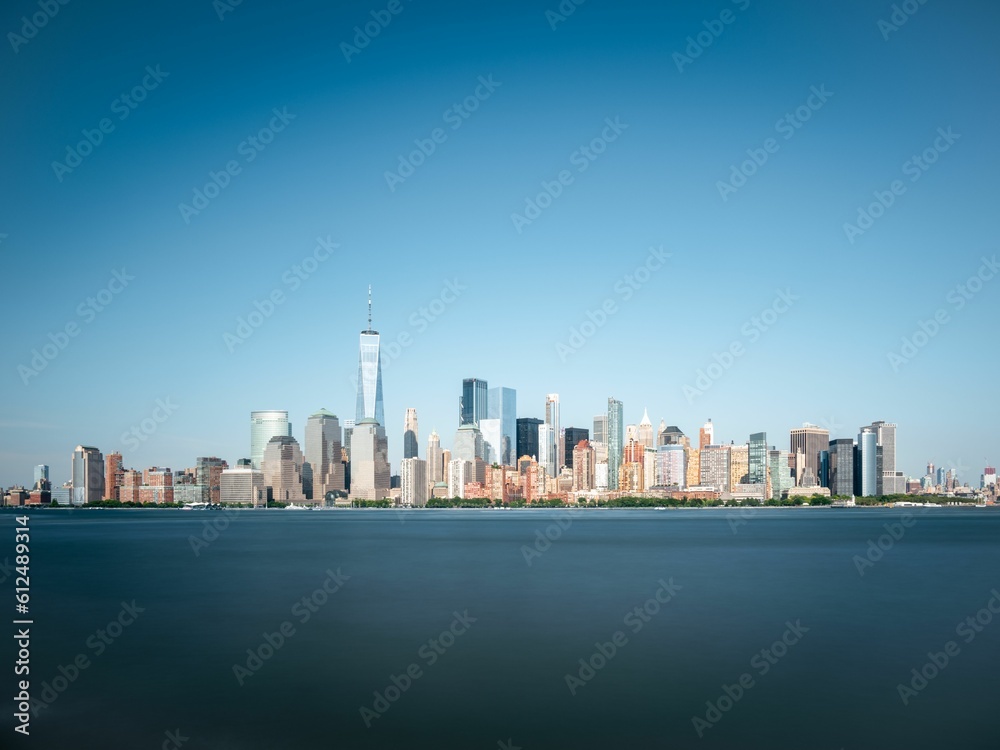 Aerial skyline of Manhattan in New York City, United States on blue sky background