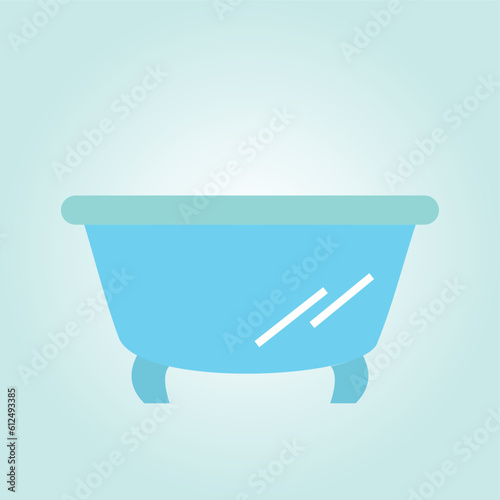Bathtub isolated on a pale turquoise background.