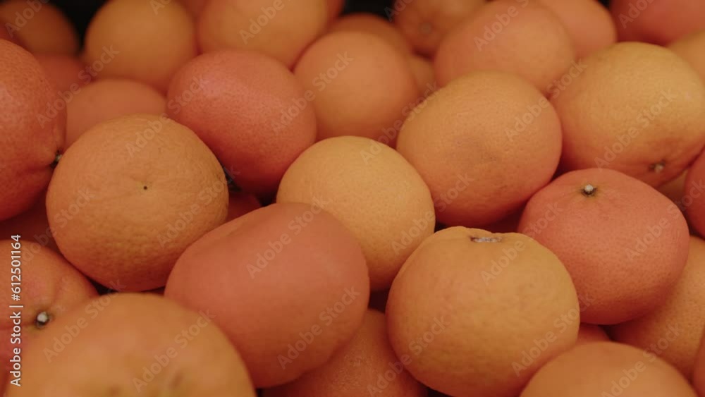 Closeup of bunch of mandarines in a market Closeup of bunch of mandarines in a market