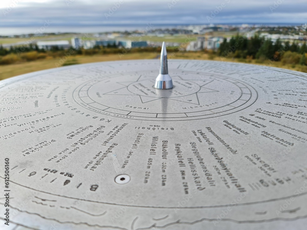 Beautiful shot of the round dial in Flateyri in the park in Iceland