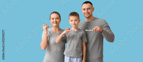 Happy family brushing teeth...