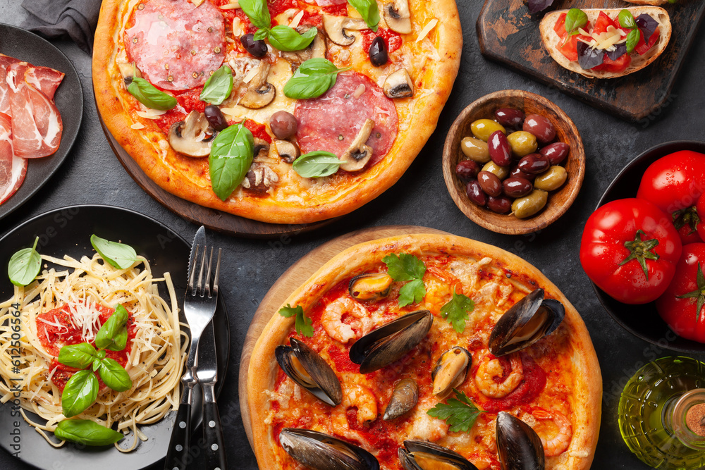 Italian cuisine. Pizza, pasta and toasts Italian cuisine. Pizza, pasta and toasts